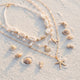 Ras-de-Cou Multi-Rangs Étoiles de Mer Coquillages & Perles - Style 1 - Soin & GrâceSoin & GrâceStyle 23840bf4ad74e1f06725d63c8fdf463ee